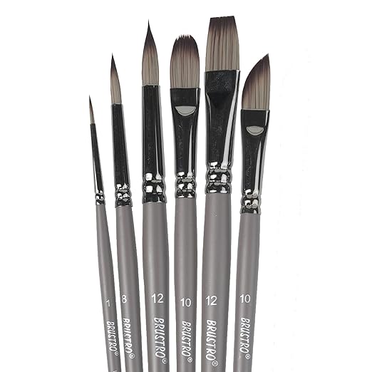 Set of paint brushes with black handles and silver ferrules on a white background