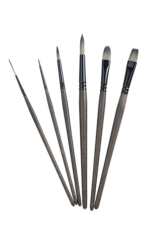 Set of paint brushes on a white background