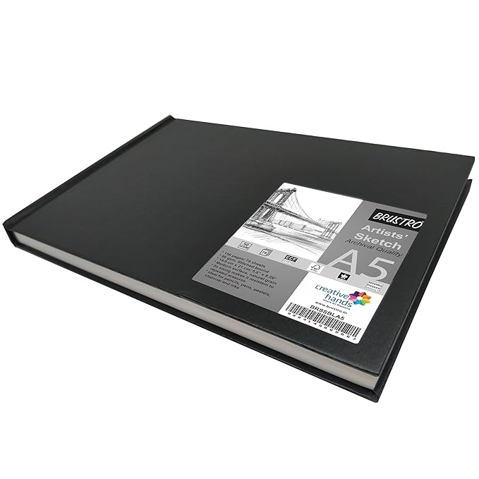 Black sketchbook with a label on a white background