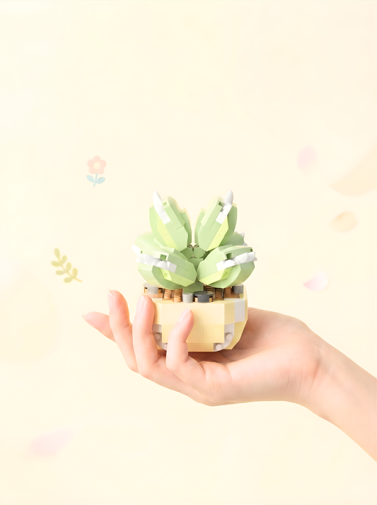 Hand holding a small potted plant with a plain background