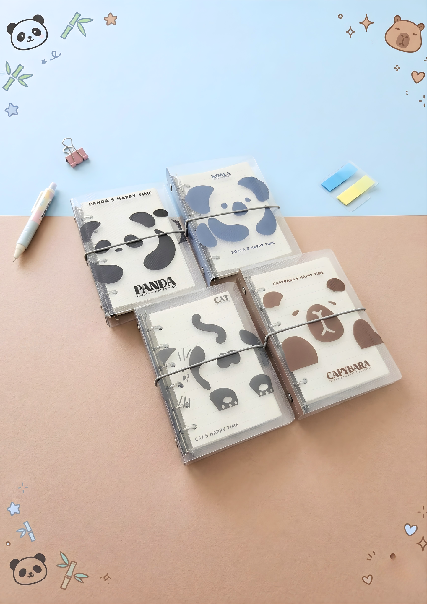 Four small notebooks with animal illustrations on a beige surface with a light blue background.