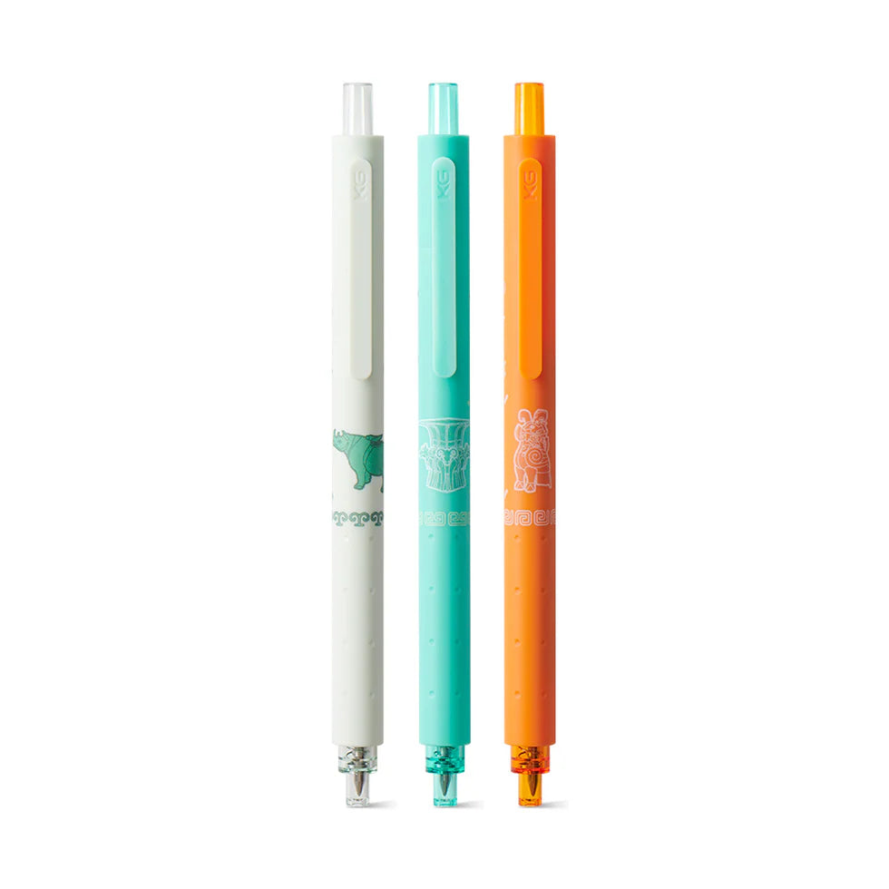 Three colorful pens with different colored caps on a white background