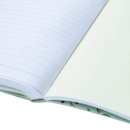 Open notebook with lined pages on a light green background