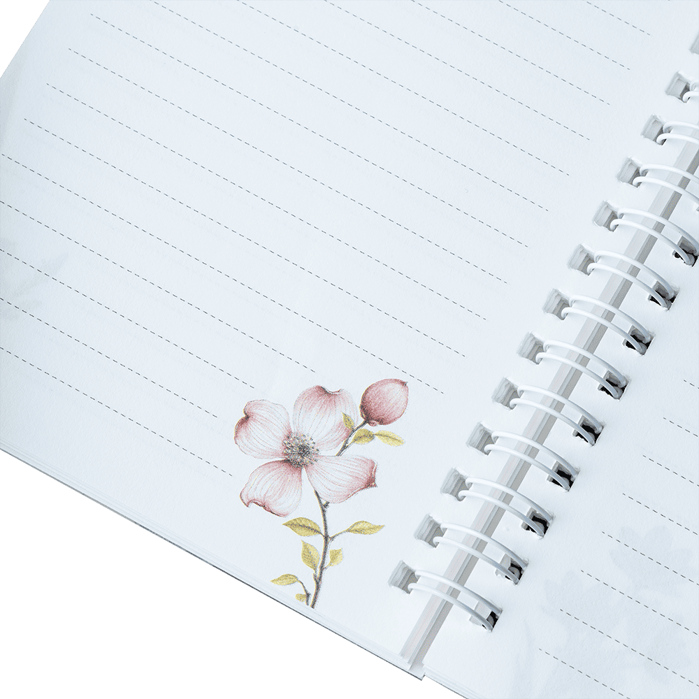 Notebook page with a floral illustration on lined paper