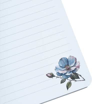 Notebook with floral design on a green background