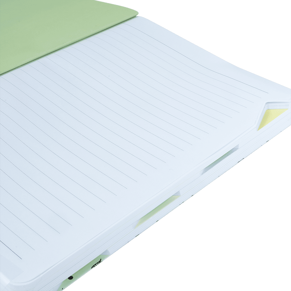 Notebook with green cover on a green background