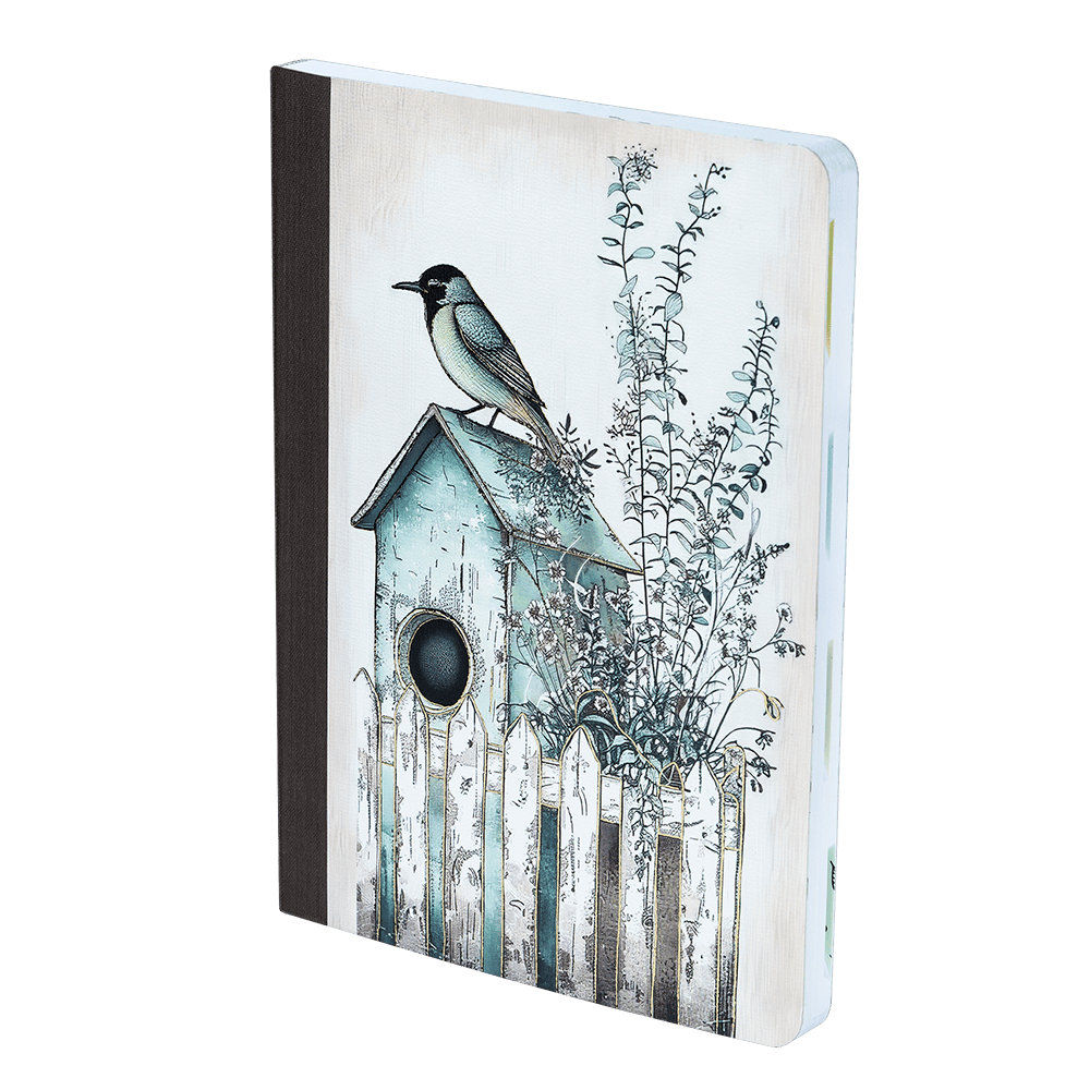 Notebook with a birdhouse and bird illustration on the cover