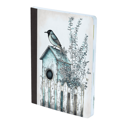 Notebook with a birdhouse and bird illustration on the cover