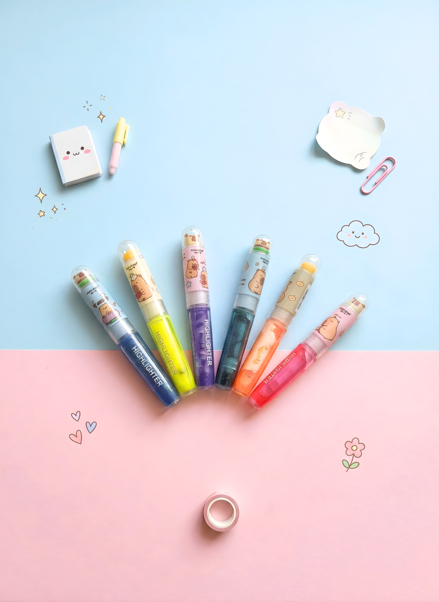 Colorful stationery items on a pink and blue background