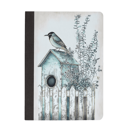 Notebook with a birdhouse and bird illustration on the cover against a green background