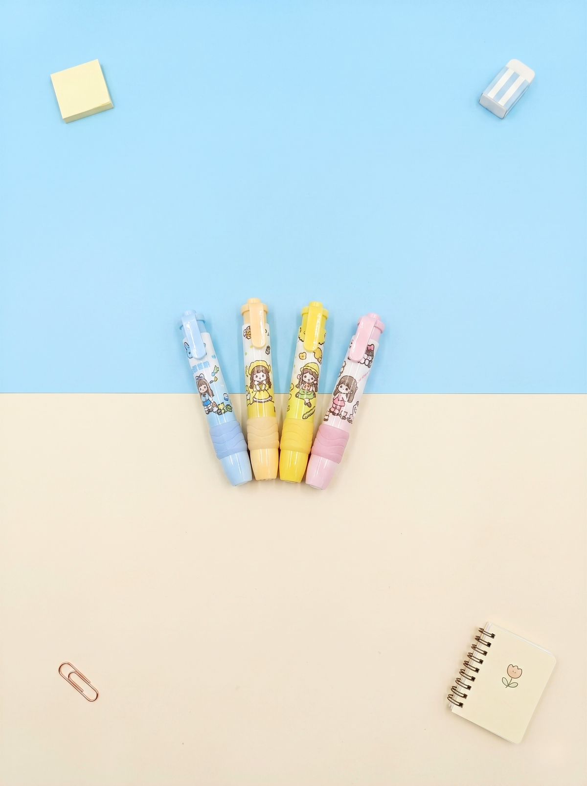 Five colorful cartoon-style修正带 on a light blue and beige background