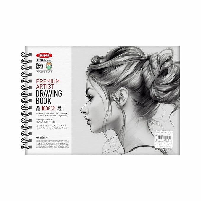 Drawing book with a black and white illustration of a woman's profile on the cover