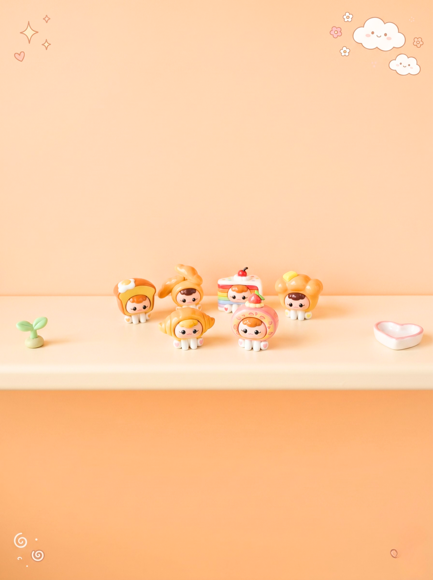 Set of small figurines on a peach-colored background