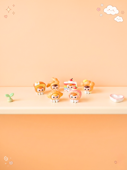Set of small figurines on a peach-colored background