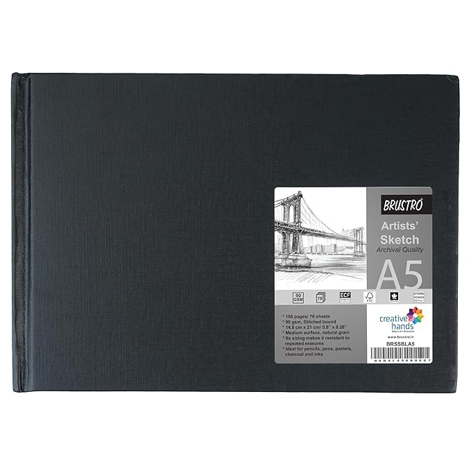 Black artists' sketchbook with a label on a white background