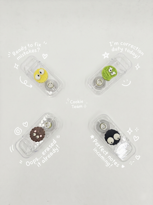 Four correction tape dispensers with cartoon characters on a light gray background