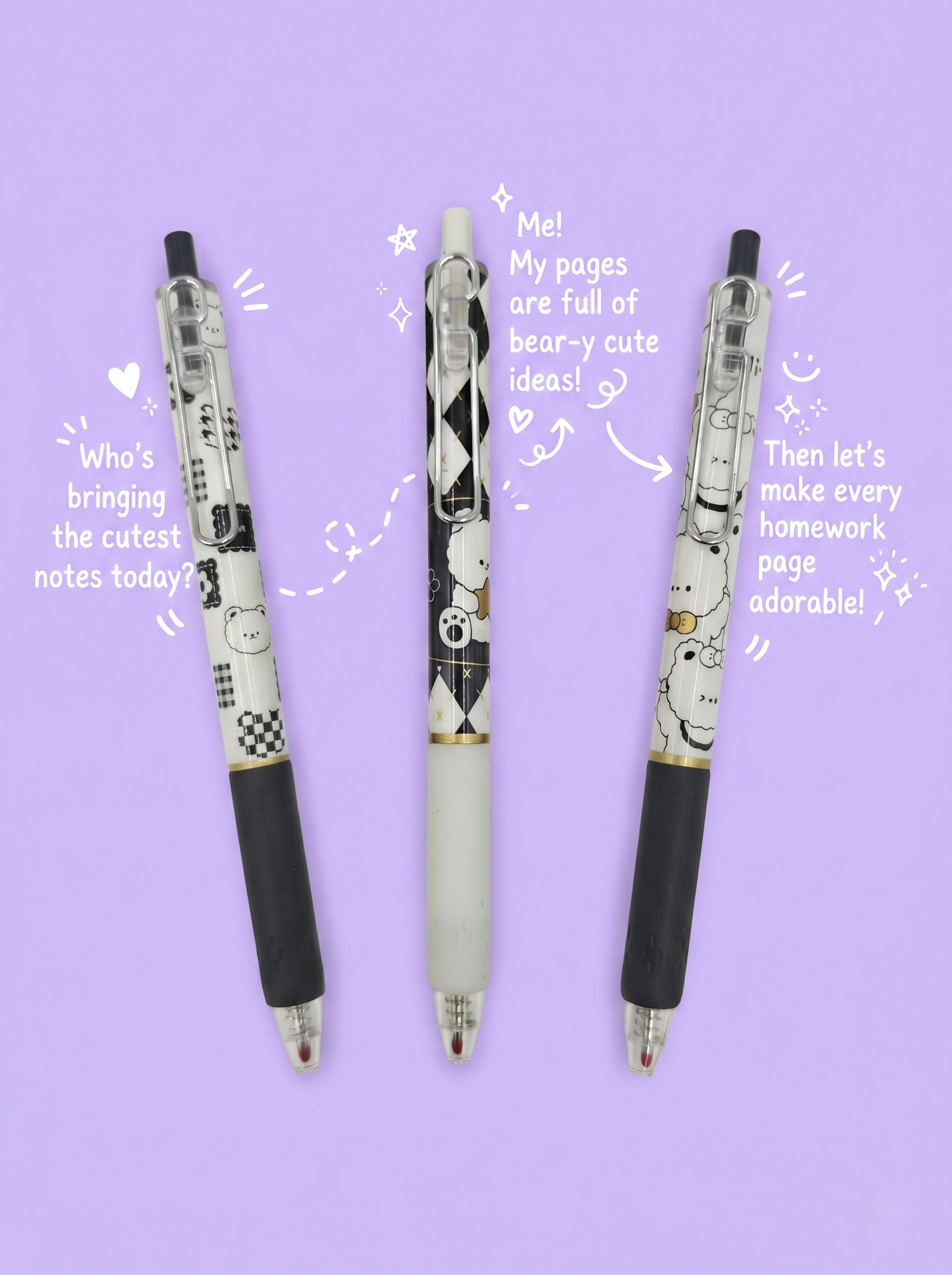 Three pens with cartoon designs on a purple background