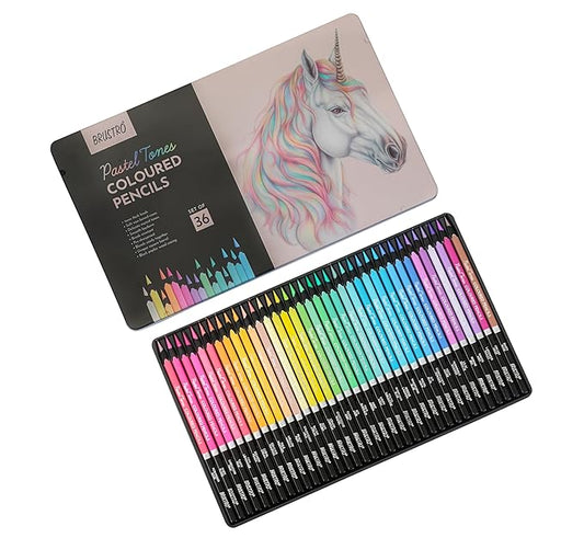 Set of colored pencils with a tin featuring a unicorn illustration on a white background