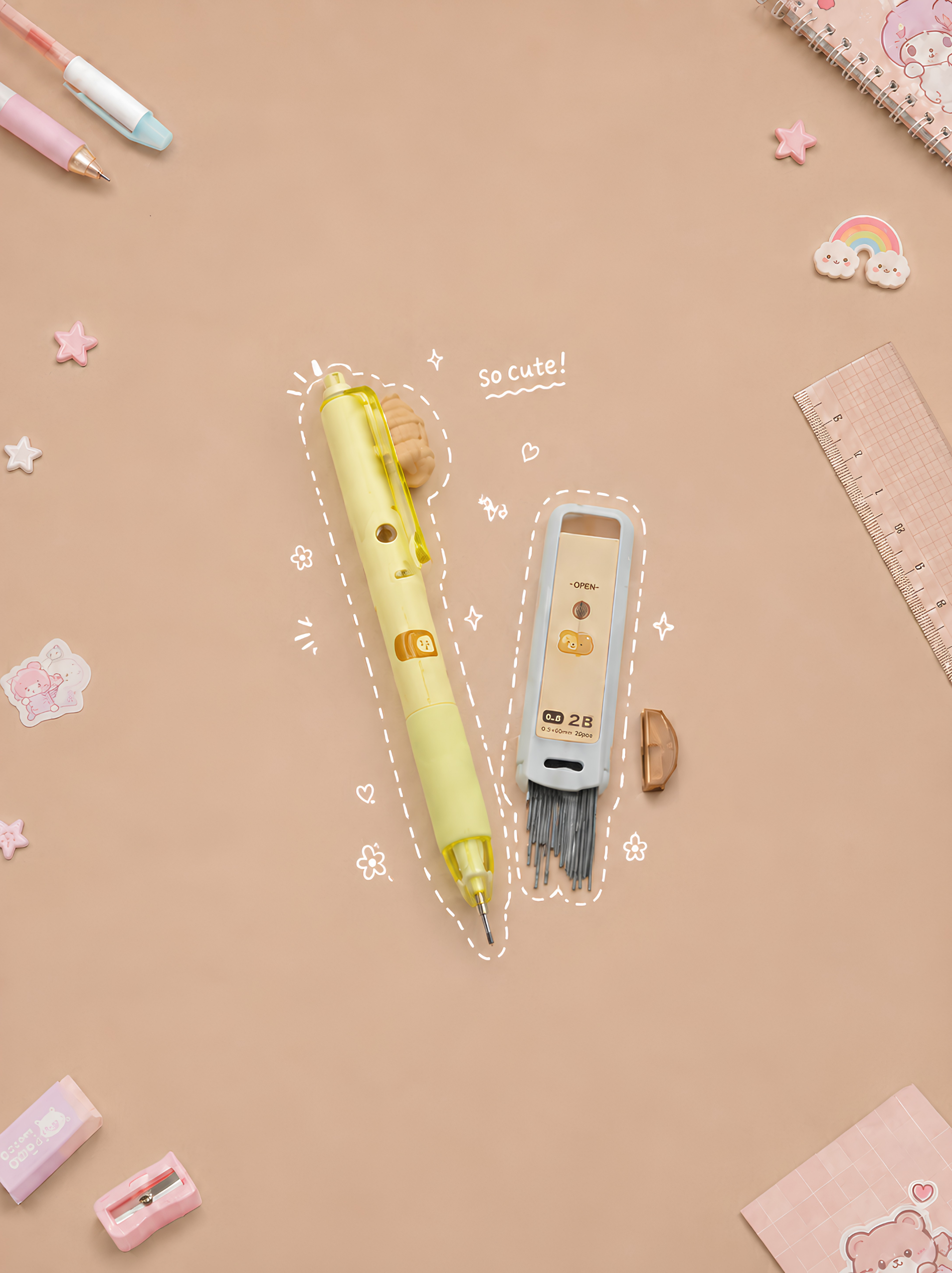 Two mechanical pencils on a beige background with stationery items around