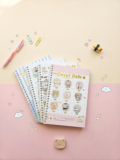 Set of three spiral-bound planners with cute animal illustrations on a pink and beige background.
