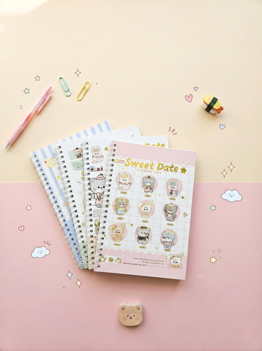 Set of three spiral-bound planners with cute animal illustrations on a pink and beige background.