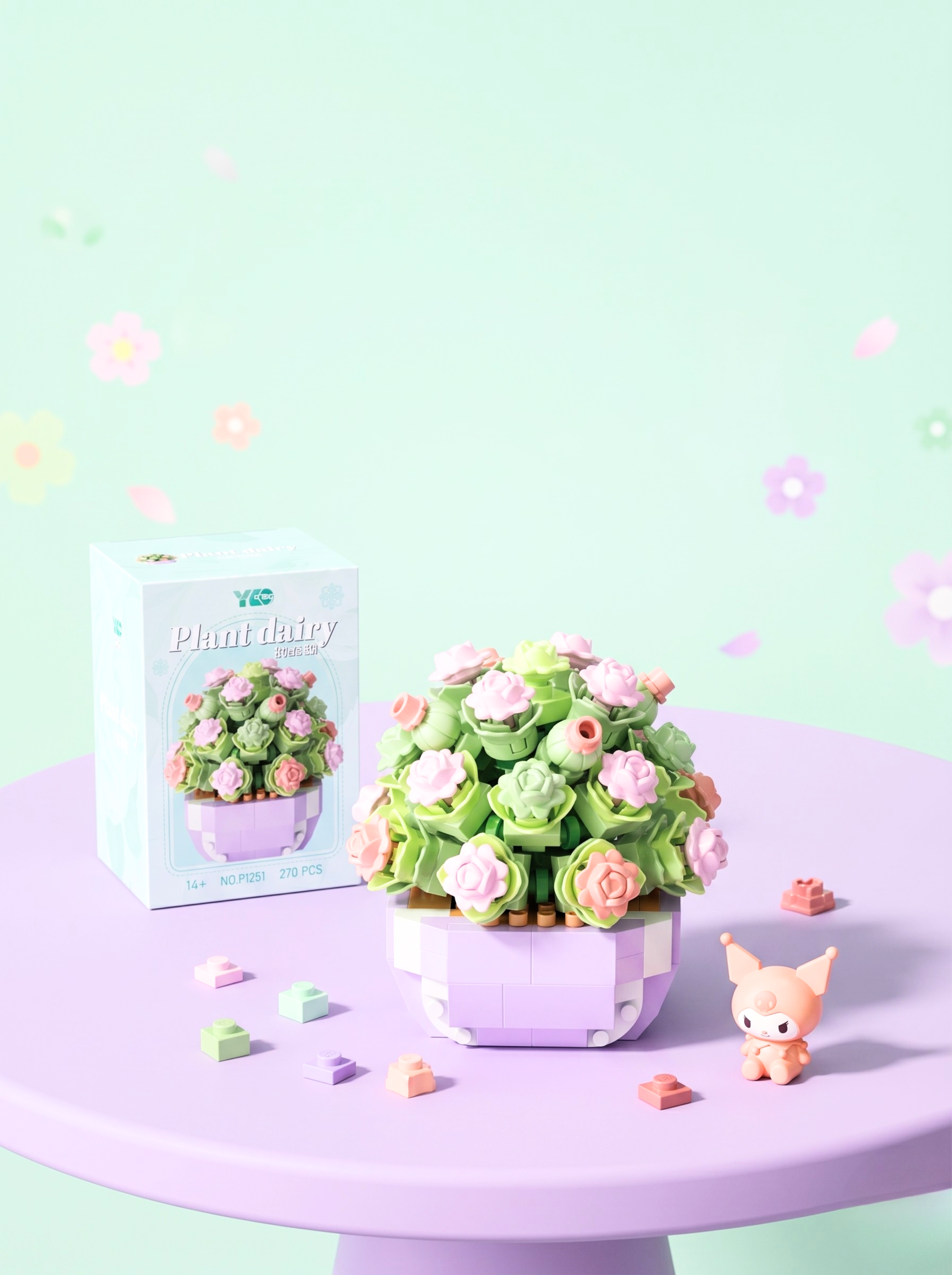 Pastel-colored floral arrangement on a purple stand with a small figurine and packaging box on a light green background.