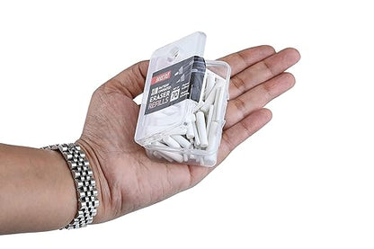Hand holding a small container of erasers with a white background