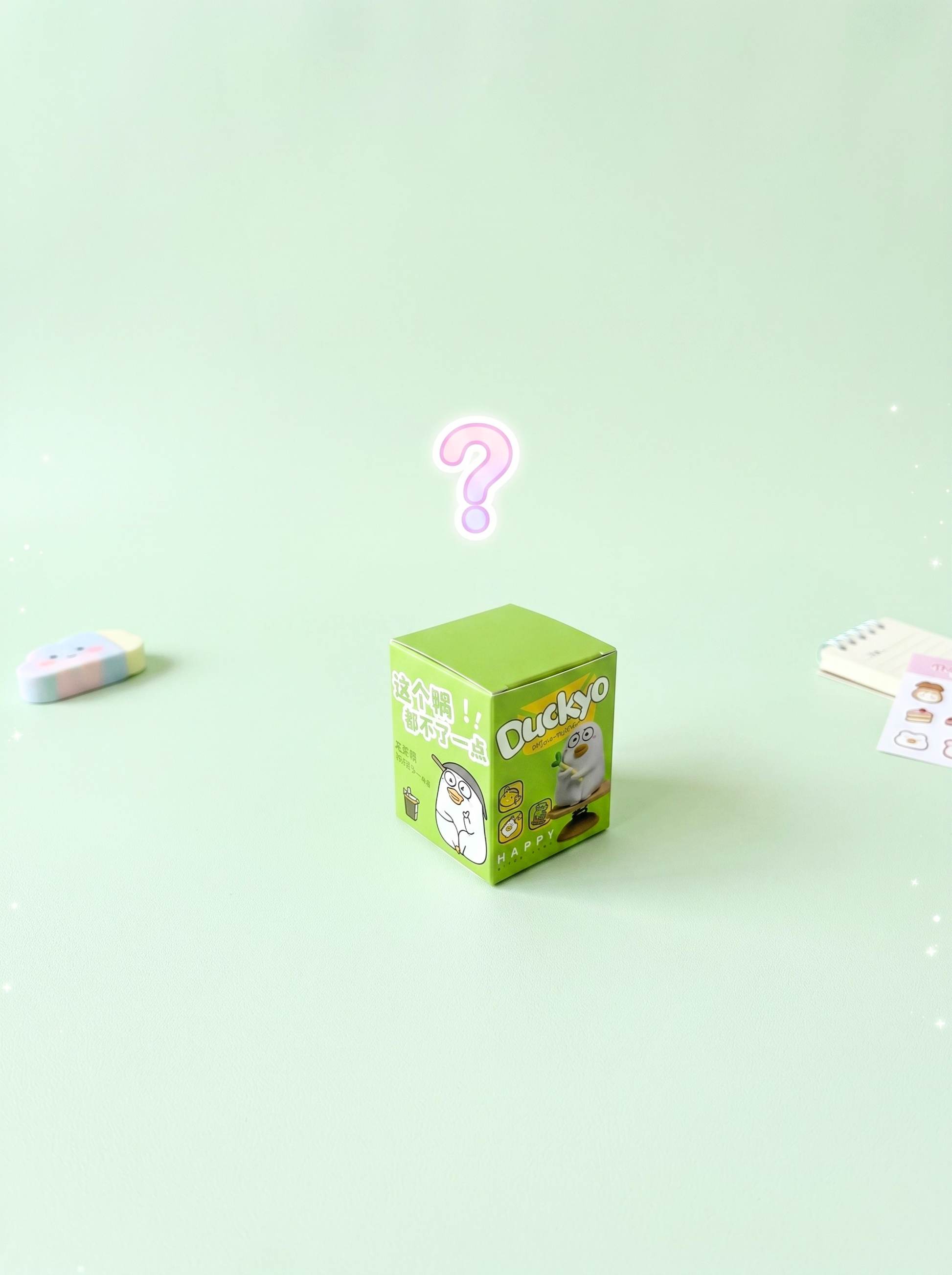 Green box with cartoon character and question mark on a light green background