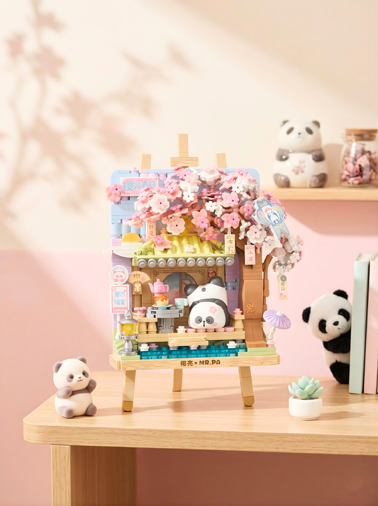Toy set with panda characters on a wooden table against a pink wall