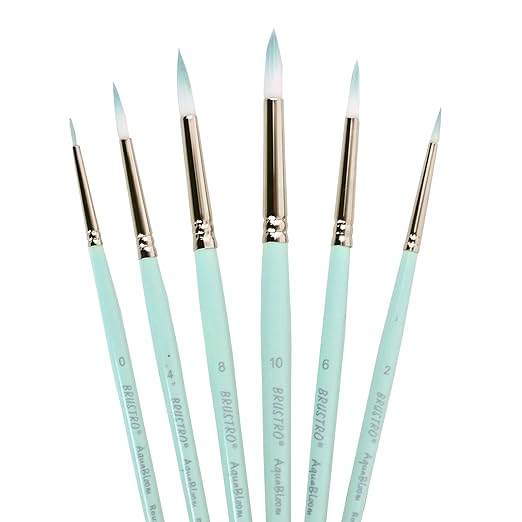 Set of paint brushes with light blue handles on a white background