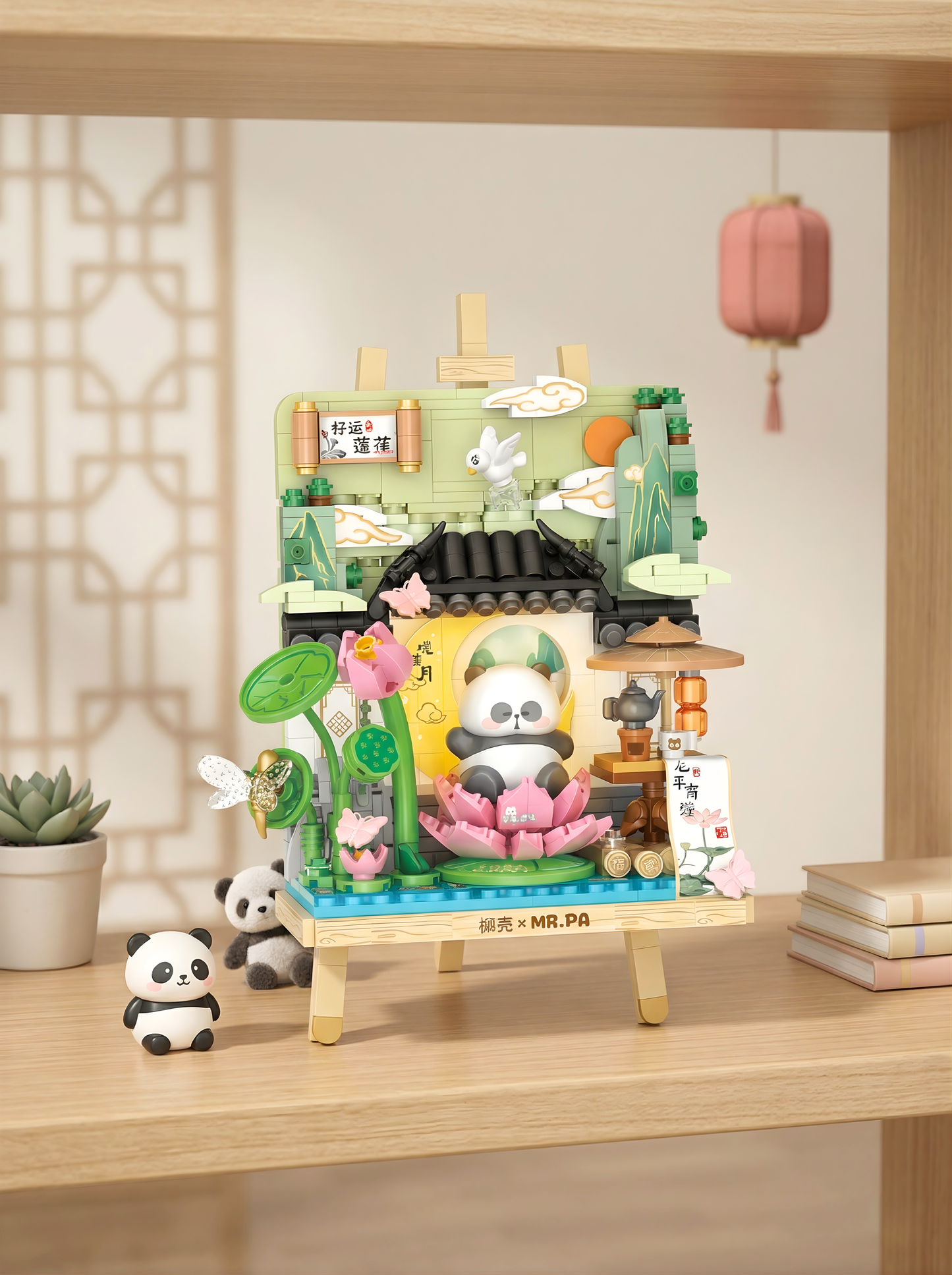 Decorative set with panda figures and a small building on a wooden shelf.