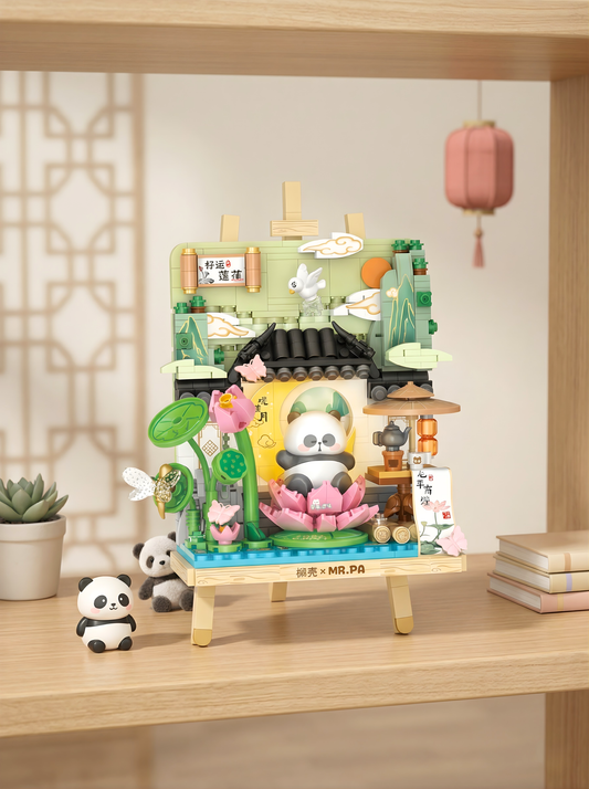 Decorative set with panda figures and a small building on a wooden shelf.