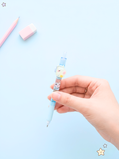 Hand holding a light blue mechanical pencil with a cartoon character on a light blue background