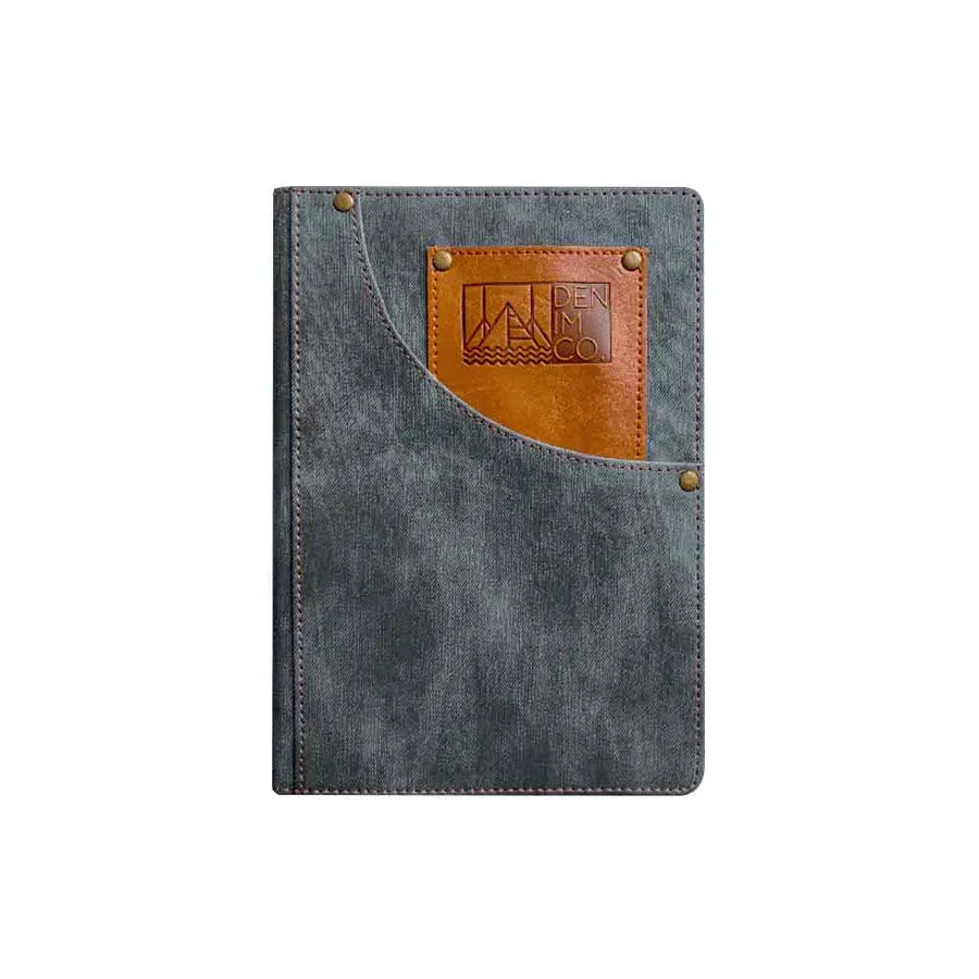 Gray denim notebook with brown leather patch and logo on a white background