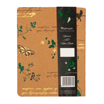 Notebook with decorative cover featuring plants and birds, branded 'Nightingale'.