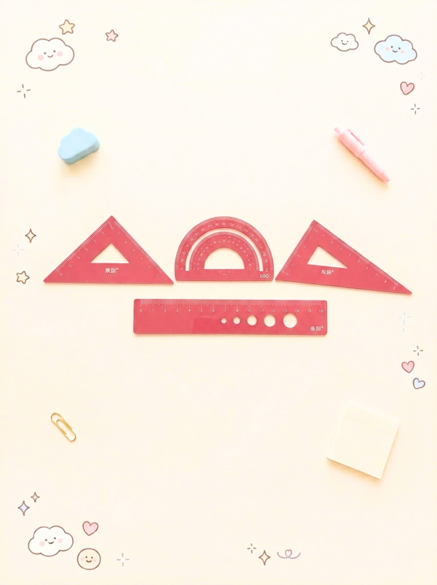 Decorative wallpaper with geometric shapes and stationery items on a light background