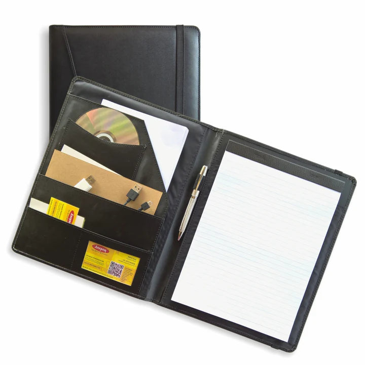 Black leather portfolio with open pages showing a CD, paper, and pen on a white background