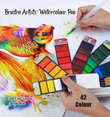 Set of watercolor pans with a colorful painting in the background