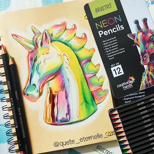 Colorful unicorn drawing on a notebook with Bristro neon pencils packaging.