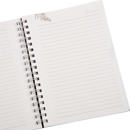 Open notebook with lined pages on a white background