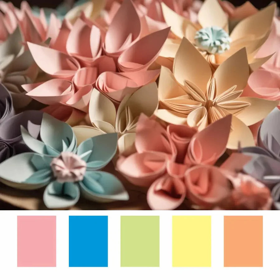 Color swatches of pink, blue, green, yellow, and orange next to paper flowers in those colors.