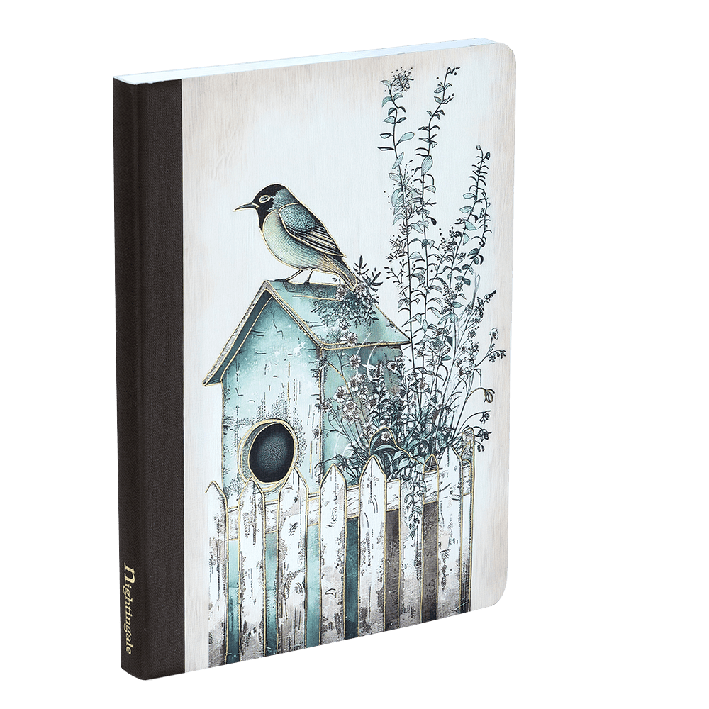 Notebook with a birdhouse and bird illustration on the cover