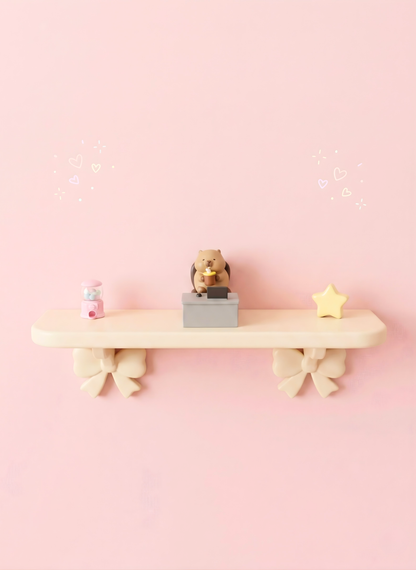 Wooden shelf with decorative items on a pink background