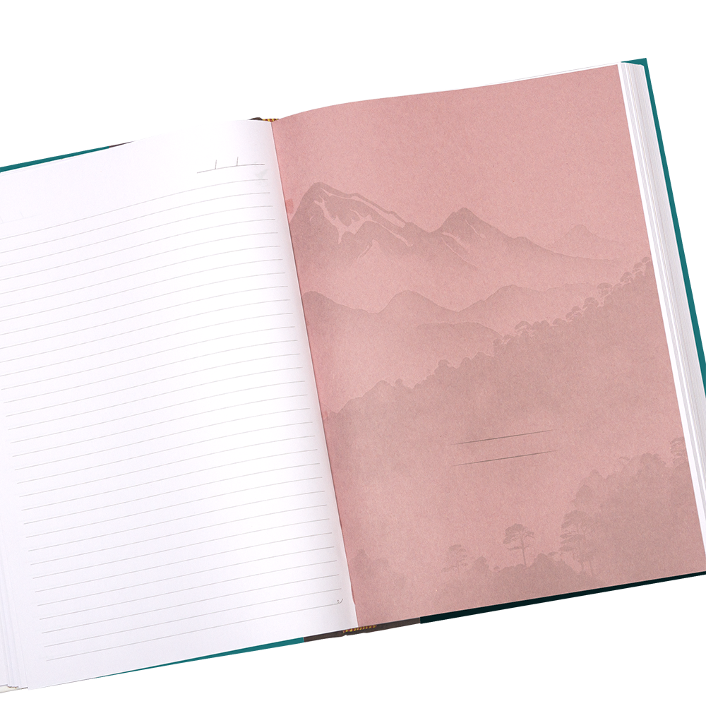Open notebook with a pink page featuring a mountain landscape design.
