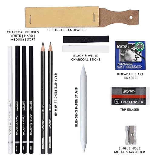 Collection of art supplies including charcoal pencils, sandpaper, and erasers on a white background.