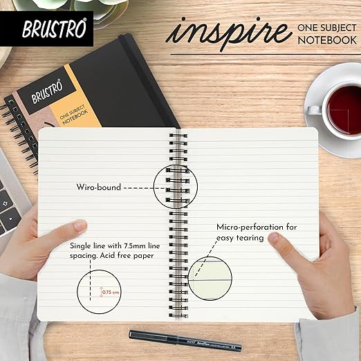 Brustro 'Inspire' one subject notebook with features highlighted on a wooden desk.