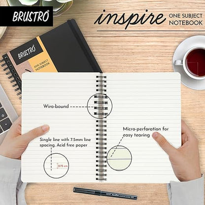 Brustro 'Inspire' one subject notebook with features highlighted on a wooden desk.