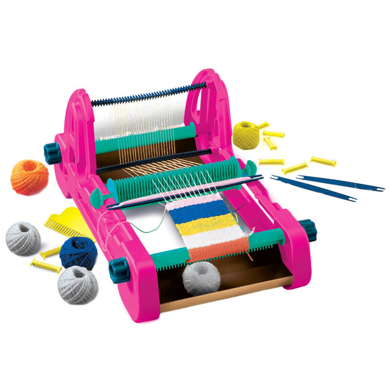 Pink yarn loom with colorful yarn and tools on a white background