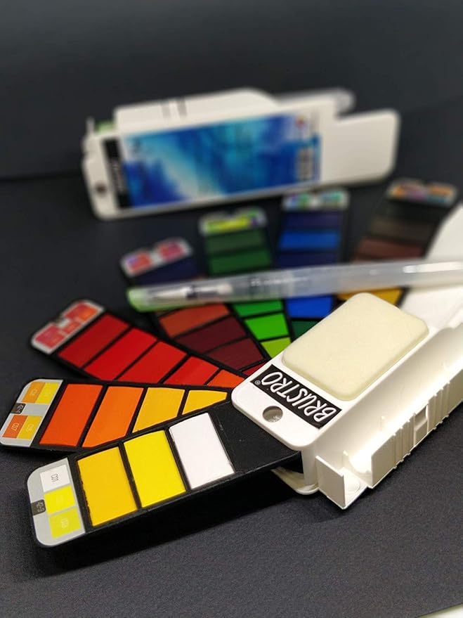 Color swatches and a paint palette on a dark surface