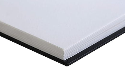 Close-up of a black-bound book with white pages on a white background